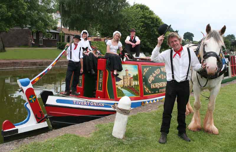 The team with the barge and shire horse by the canal.